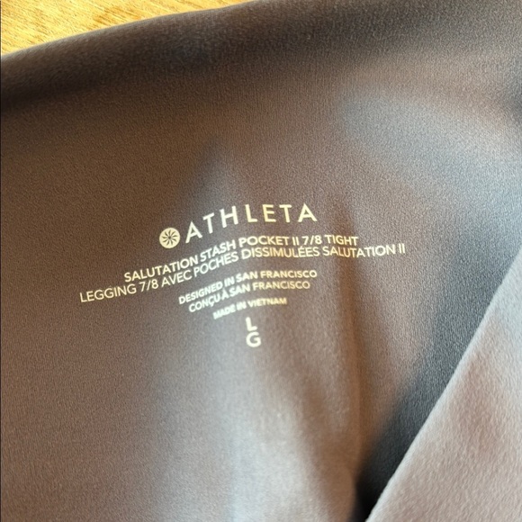 Athleta Salutation stash pocket II 7/8 Tight Leggings Size L - Picture 6 of 7